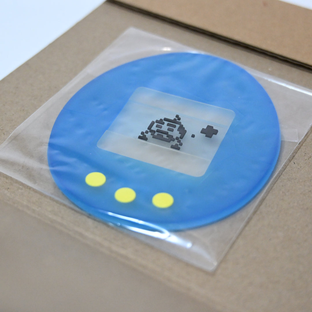 Tamagotchi Mini Foldable Box + Clear Rubber Coaster